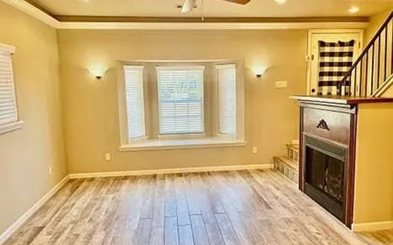 Living room with fireplace and hardwood floors