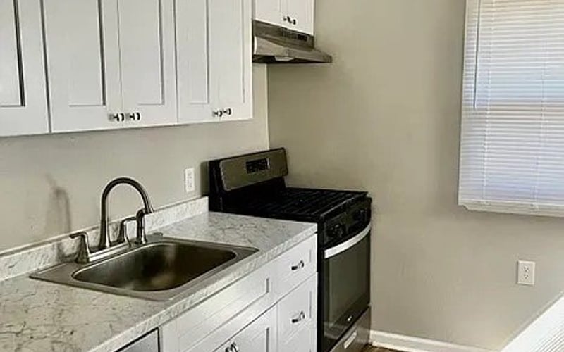 Kitchen with white cabinets