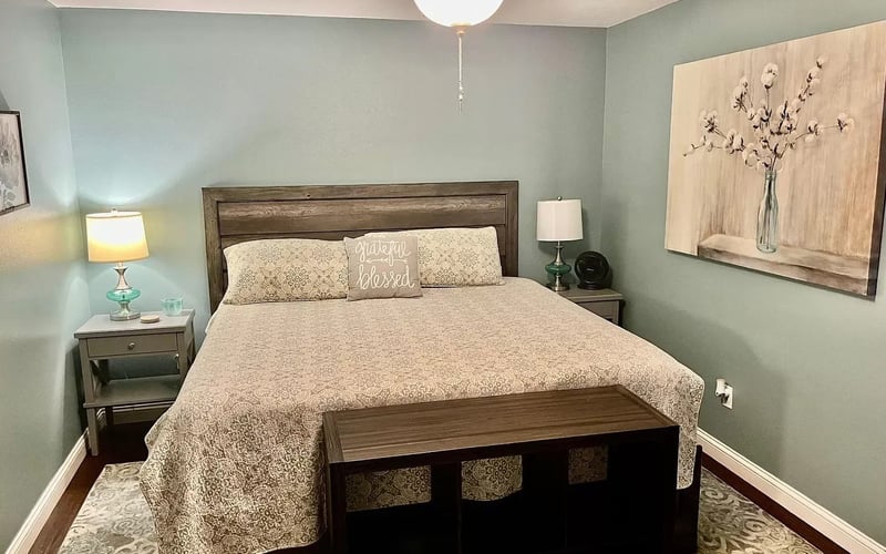 Master bedroom with wood headboard