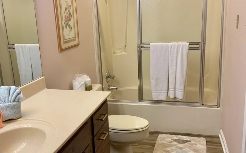 Hall bathroom with tub and shower