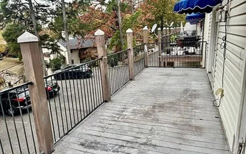 Long deck with iron railing