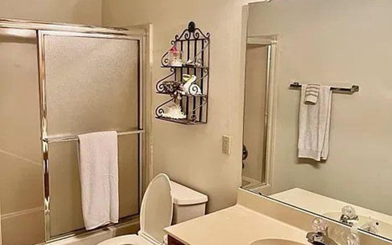 Bathroom with shower and vanity