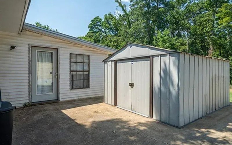 Back patio with storage shed