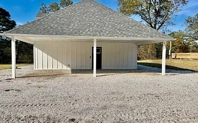 Carport with gravel driveway