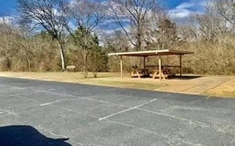 Parking area with covered picnic table