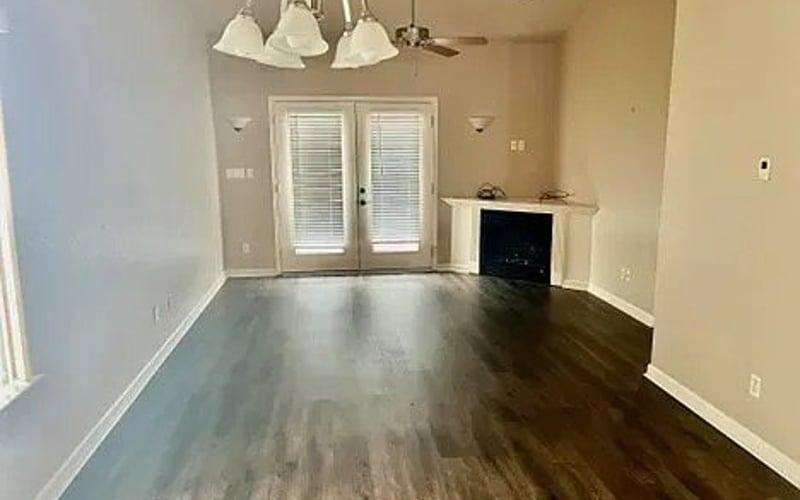 Living area with fireplace and French doors