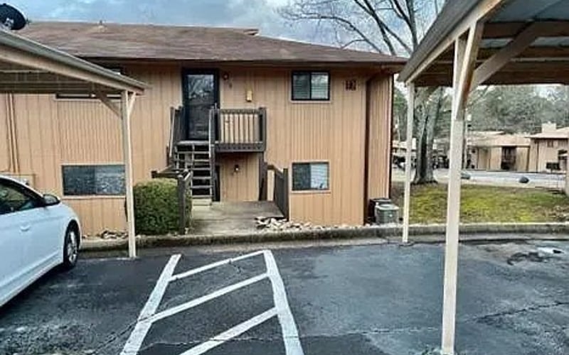 Building exterior with covered parking