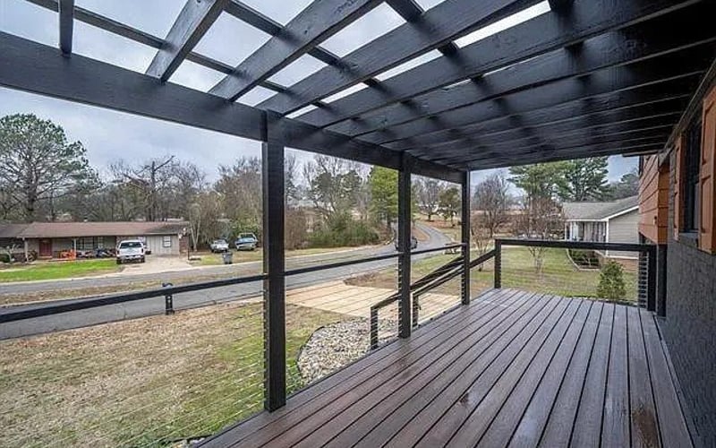 Covered deck with pergola and neighborhood view