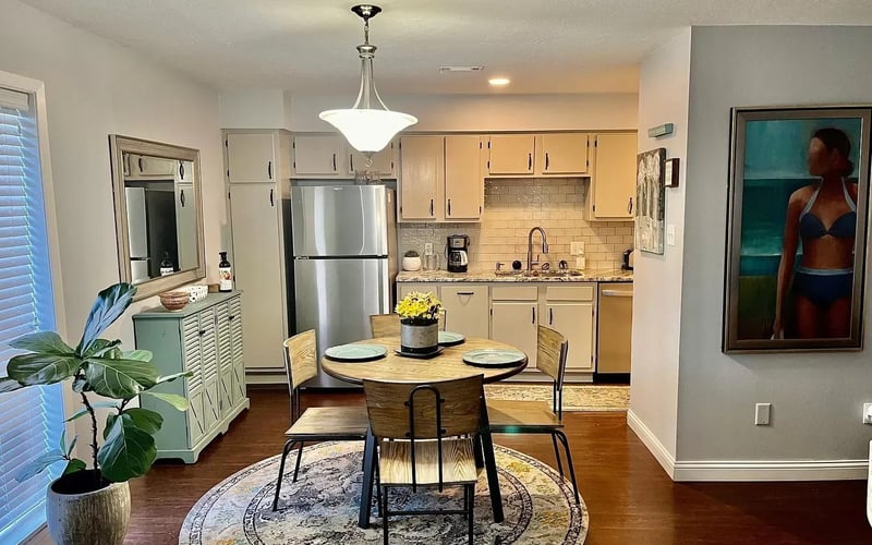 Dining area looking into kitchen