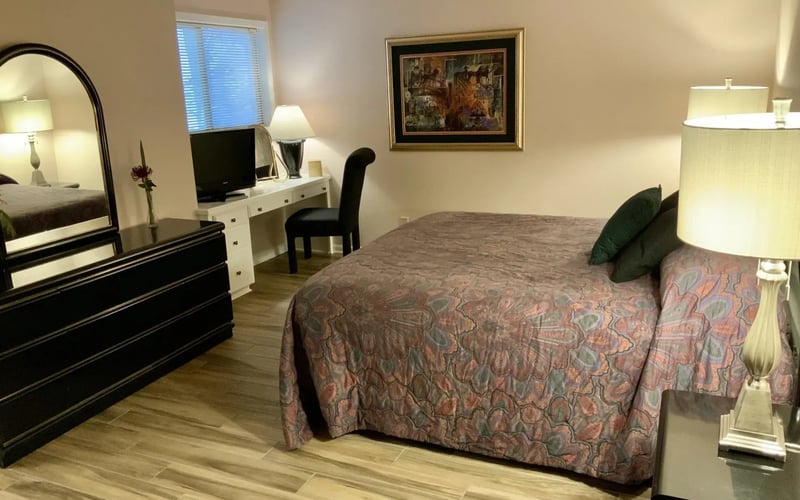 Master bedroom alternate angle with desk and TV