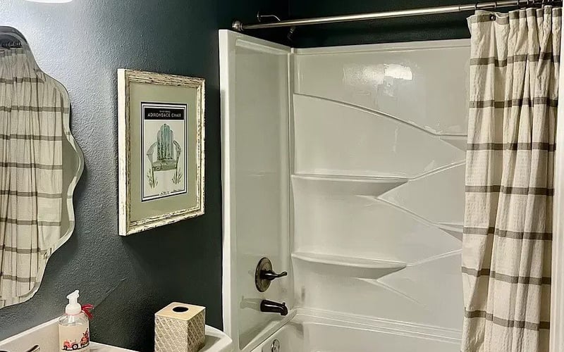 Bathroom with tub and shower