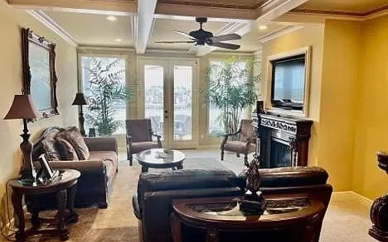 Living room wide angle with French doors to lake