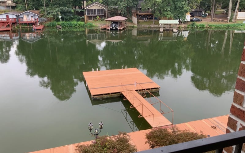 Aerial balcony view of floating dock and Lake Hamilton