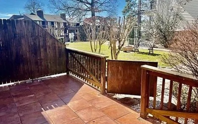 Private deck with wood railing